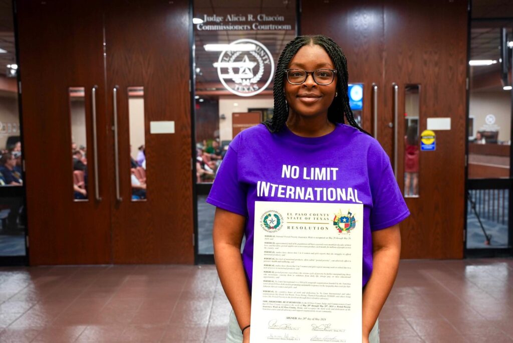 No Limit International Co-Founder Orlyanka Tantchou holding the resolution passed by the El Paso County Commissioners Court on May 20, 2024. This resolution proclaimed May 20 to May 28, 2024 as Period Poverty Awareness Week in El Paso County.